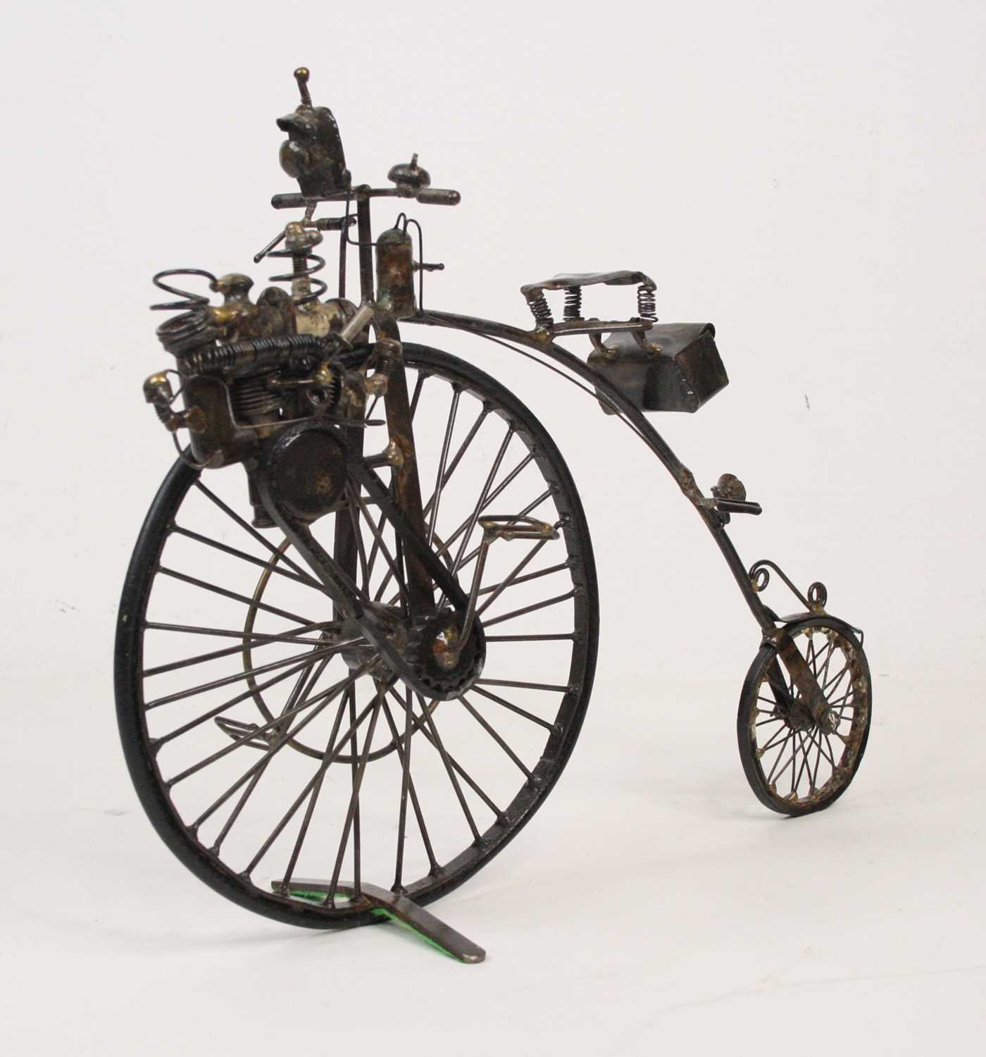 Lot 25 - A 20th century sculpture of a motorised Penny...