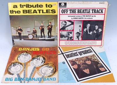 Lot 1058 - The Beatles and related, a collection of ten...