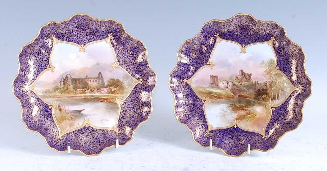Lot 2089 - A pair of 1909 Royal Doulton porcelain cabinet...