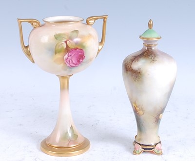 Lot 2078 - A 1911 Royal Worcester porcelain twin handled...