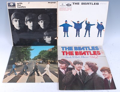 Lot 1040 - The Beatles, a collection of five LP's to...