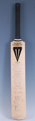 Lot 1278 - A Duncan Fearnley cricket bat, signed by...
