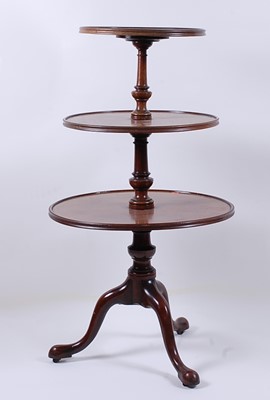 Lot 2479 - A George III mahogany three-tier dumb waiter,...