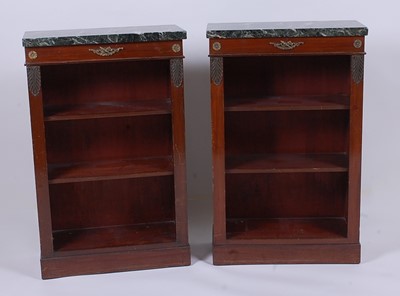 Lot 2466 - A pair of mahogany open bookshelves in the...