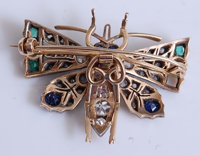 Lot 2199 - A yellow and white metal winged insect brooch,...