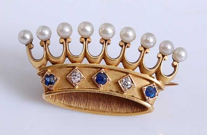 Lot 2202 - A yellow metal brooch in the form of a coronet,...