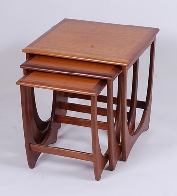 Lot 560 - A 1960s G-Plan 'Fresco' teak nest of three...