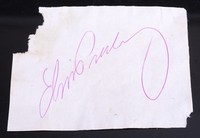 Lot 1178 - Elvis Presley, autograph in pink ink on paper,...