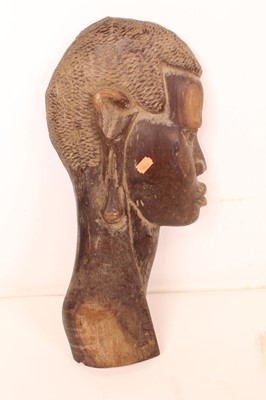 Lot 27 - A pair of 20th century African hardwood...