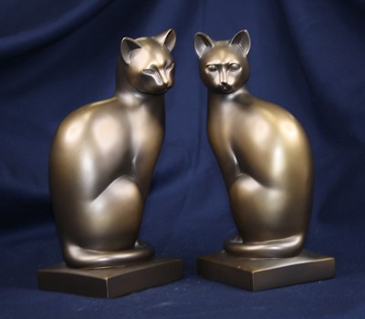 Lot 32 - A pair of composition models of cats, height 28cm
