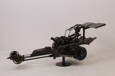 Lot 60 - A 20th century sculpture of a Dragster racing...