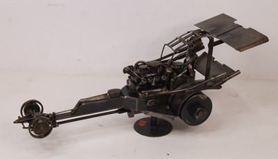 Lot 60 - A 20th century sculpture of a Dragster racing...