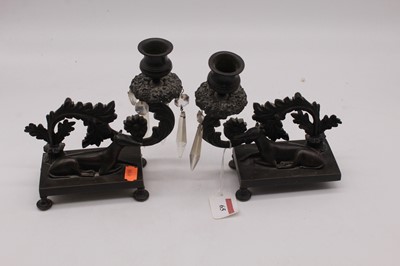 Lot 65 - A pair of 19th century bronze candlesticks,...