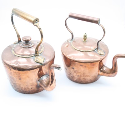 Lot 227 - Two Victorian copper range kettles, the...