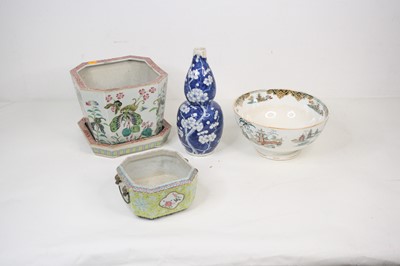 Lot 136 - A Chinese stoneware jardiniere, enamel painted...
