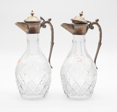 Lot 152 - A pair of silver plated and cut glass claret...
