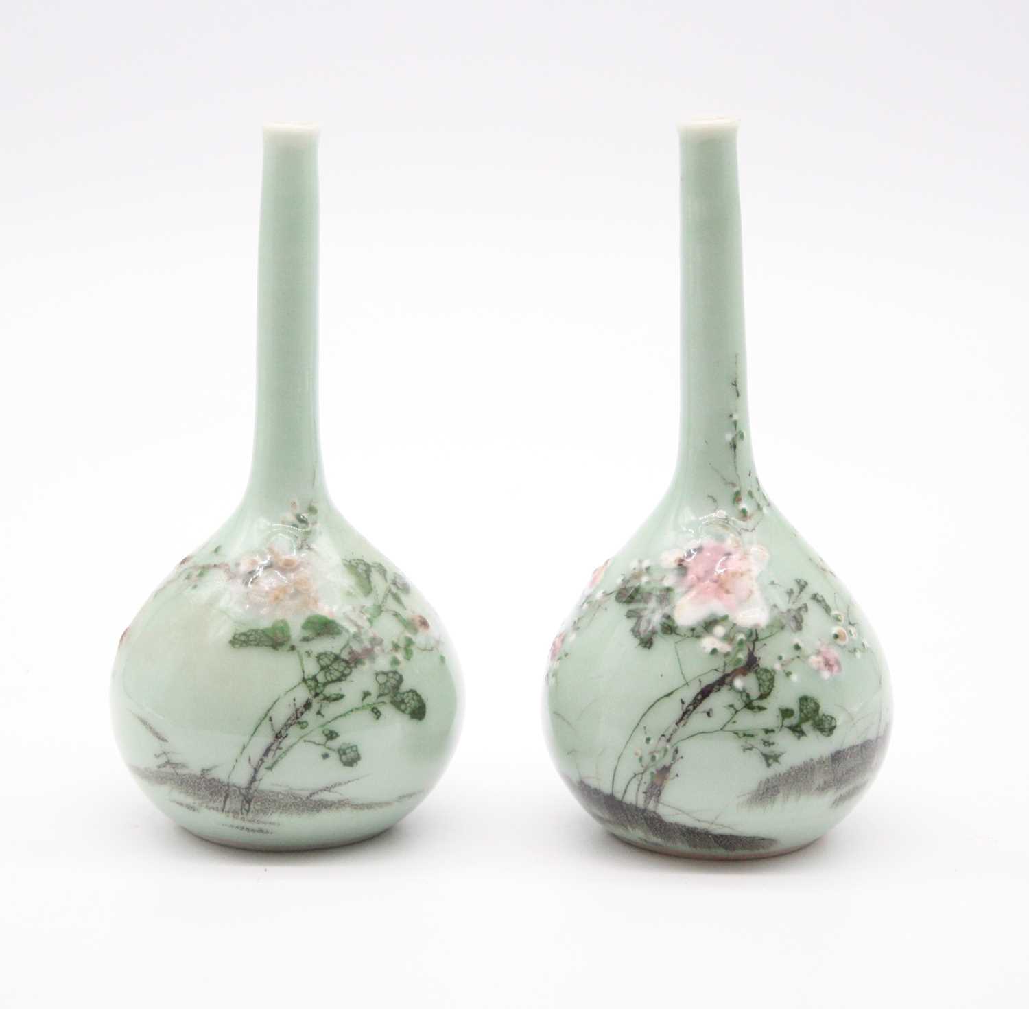 Lot 258 - A pair of Chinese celadon glazed bottle vases,...