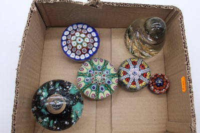 Lot 283 - A collection of six glass paperweights, to...
