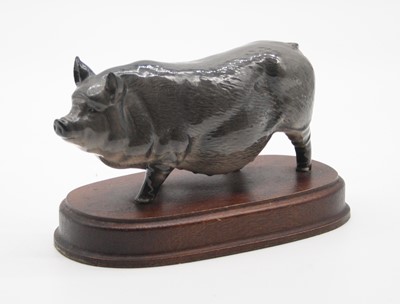 Lot 287 - A 20th century porcelain model of a sow,...