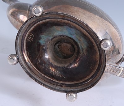 Lot 2109 - A George III silver pedestal teapot, having...