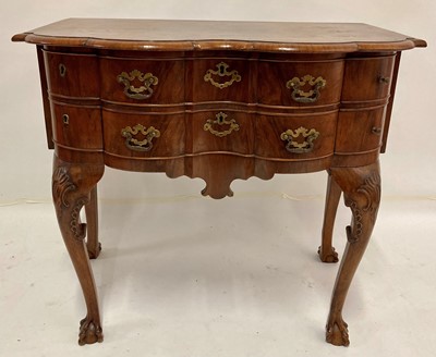 Lot 2473 - A Queen Anne style figured walnut six drawer...