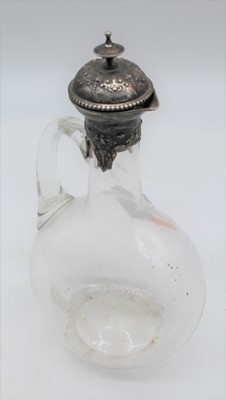 Lot 396 - A Victorian carafe, having a clear glass body...