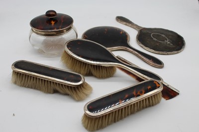 Lot 408 - A George V silver and tortoiseshell five piece...