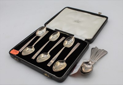 Lot 411 - A cased set of six silver teaspoons in the Art...
