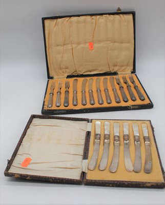 Lot 412 - A cased set of six tea knives and forks having...