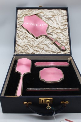 Lot 413 - A George V lady's silver and pink guilloche...