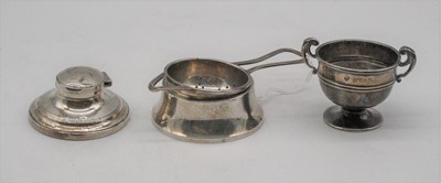 Lot 443 - A George V silver tea strainer on stand...