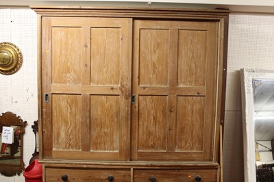 Lot 1170 - A large rustic pine housekeeper's cupboard,...