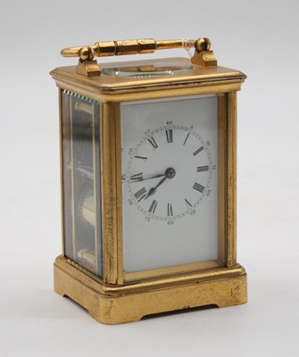 Lot 468 - A French lacquered brass cased carriage clock...