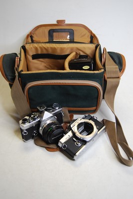 Lot 613 - An Olympus OM2 camera, with automatic control...