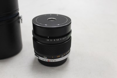 Lot 613 - An Olympus OM2 camera, with automatic control...