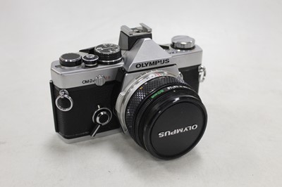 Lot 613 - An Olympus OM2 camera, with automatic control...