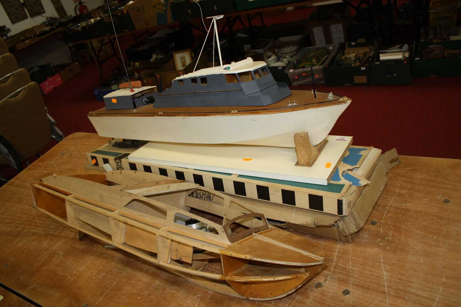 Lot 806 - A collection of toy remote control boats in...