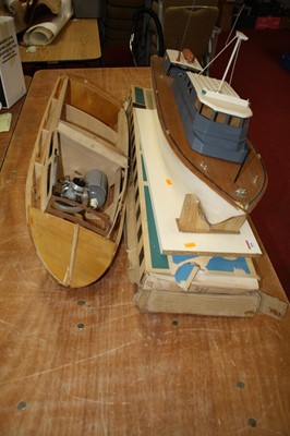 Lot 806 - A collection of toy remote control boats in...