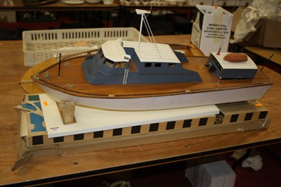 Lot 806 - A collection of toy remote control boats in...