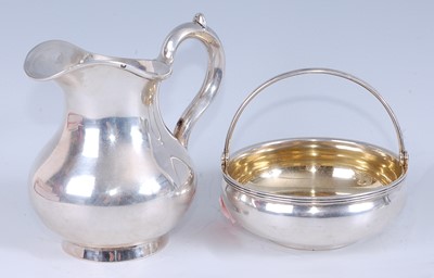 Lot 2128 - A mid-19th century Russian silver cream jug,...