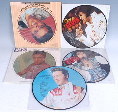 Lot 1075 - Elvis Presley, a collection of eleven picture...