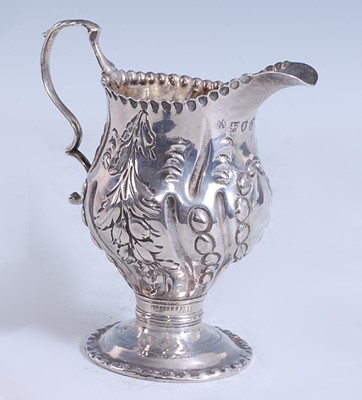 Lot 2110 - A George III silver miniature cream jug, of...
