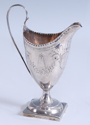 Lot 2111 - A George III silver helmet form pedestal cream...