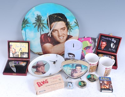 Lot 1102 - A collection of Elvis Presley memorabilia, to...