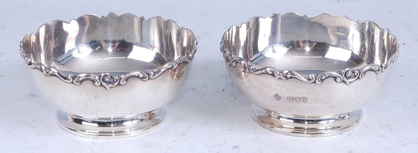 Lot 236 - A pair of early 20th century silver circular...