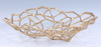 Lot 330 - Tom Dixon - a large 'bone' bowl, brass,...