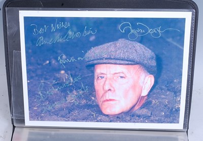 Lot 1174 - An album of signed film related photographs...