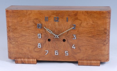 Lot 314 - An Art Deco figured walnut mantel...