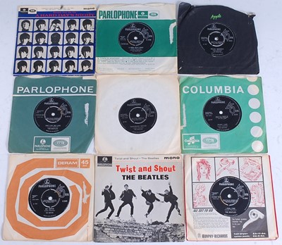 Lot 1087 - The Beatles, a collection of nine 7" singles...
