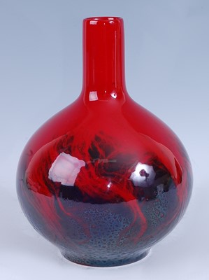 Lot 70 - A Royal Doulton flambé glazed ceramic bottle...
